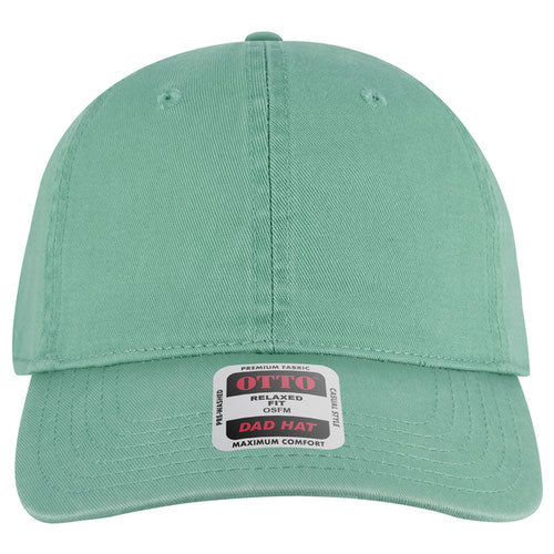Turquoise cap with a label on a white background